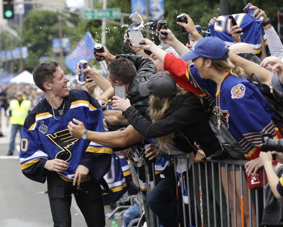 St. Louis Blues goalie Jordan Binnington celebrates with fans during the Blues' Stanley Cup victory parade on Saturday, June 15.