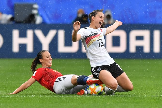 Spanish midfielder Virginia Torrecilla tackles Germany's Sara Dabritz during a World Cup match in Valenciennes, France, on Wednesday, June 12.