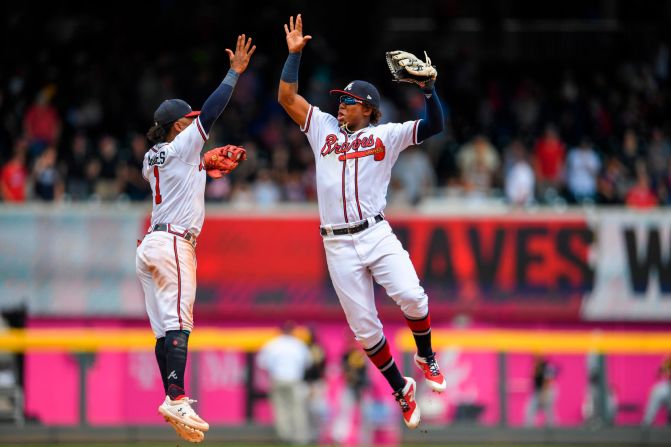 Atlanta's Ozzie Albies and Ronald Acuna Jr. celebrate after a win over Pittsburgh on Thursday, June 13.