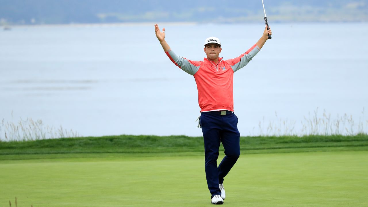 Gary Woodland celebrates on the 18th green after winning the 2019 US Open at Pebble Beach Golf Links on June 16, 2019. 