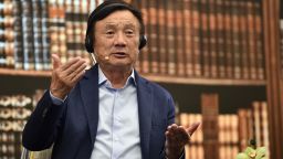 Huawei founder and CEO Ren Zhengfei gestures as he hosts a panel discussion on technology, markets and enterprise in Shenzhen on June 17, 2019. 