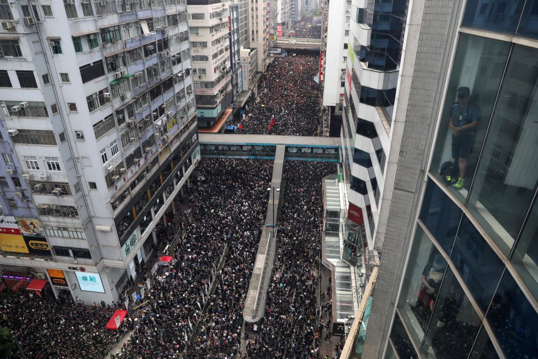 Hundreds of thousands of protesters dressed in black take part in a new rally against a controversial extradition law proposal in Hong Kong on June 16, 2019.