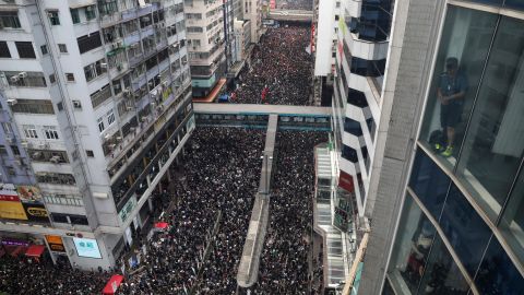 Hundreds of thousands of protesters dressed in black take part in a new rally against a controversial extradition law proposal in Hong Kong on June 16, 2019.