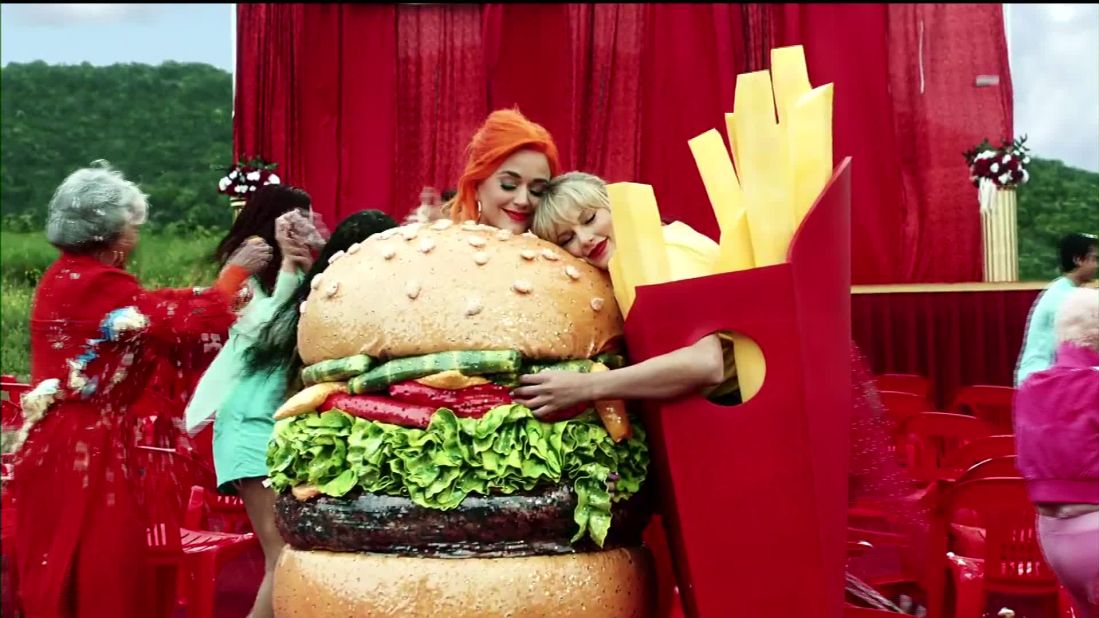 Katy Perry and Swift don costumes for Swift's "You Need to Calm Down" music video in 2019.
