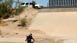 TOPSHOT - A Central American migrant and a girl cross the Rio Grande in Ciudad Juarez, State of Chihuahua, Mexico, on June 12, 2019, before turning themselves into US Border Patrol agents to claim asylum. (Photo by HERIKA MARTINEZ / AFP)        (Photo credit should read HERIKA MARTINEZ/AFP/Getty Images)