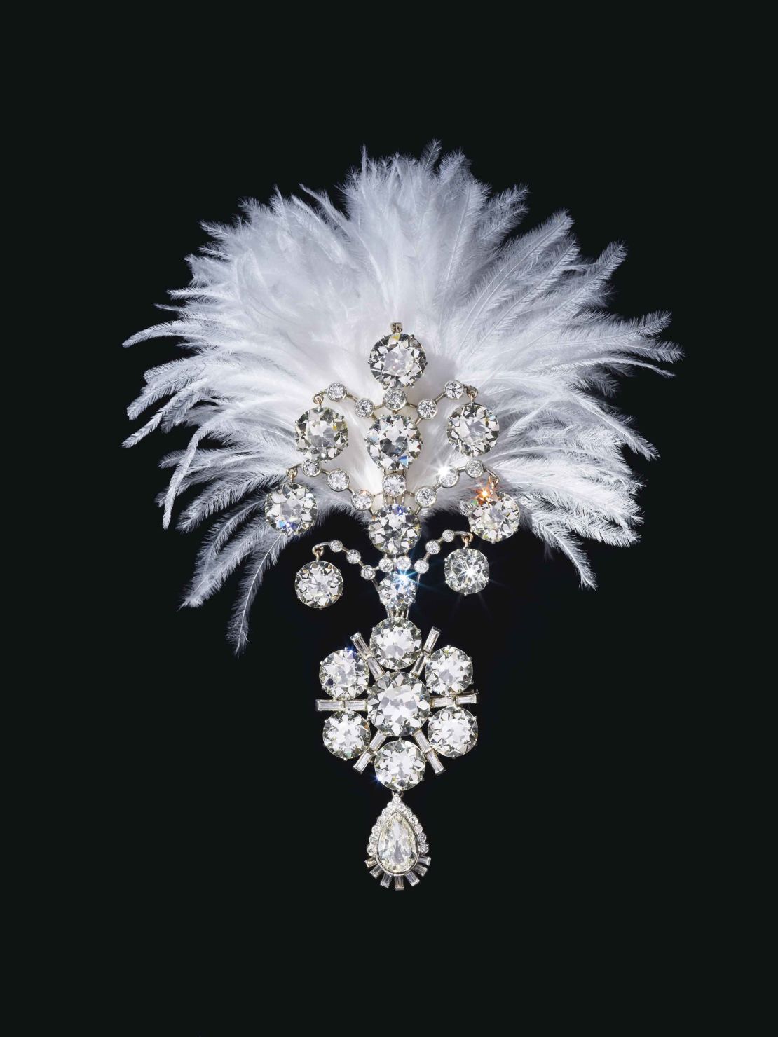 A Jigha, the turban ornament set with old, baguette and pear-shaped diamonds, white gold, fitted with plume holder on the reverse.