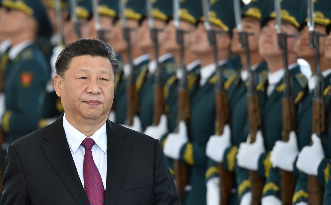 Chinese President Xi Jinping walks past honour guards during a welcoming ceremony prior to the talks with his Kyrgyz counterpart in Bishkek on June 13.