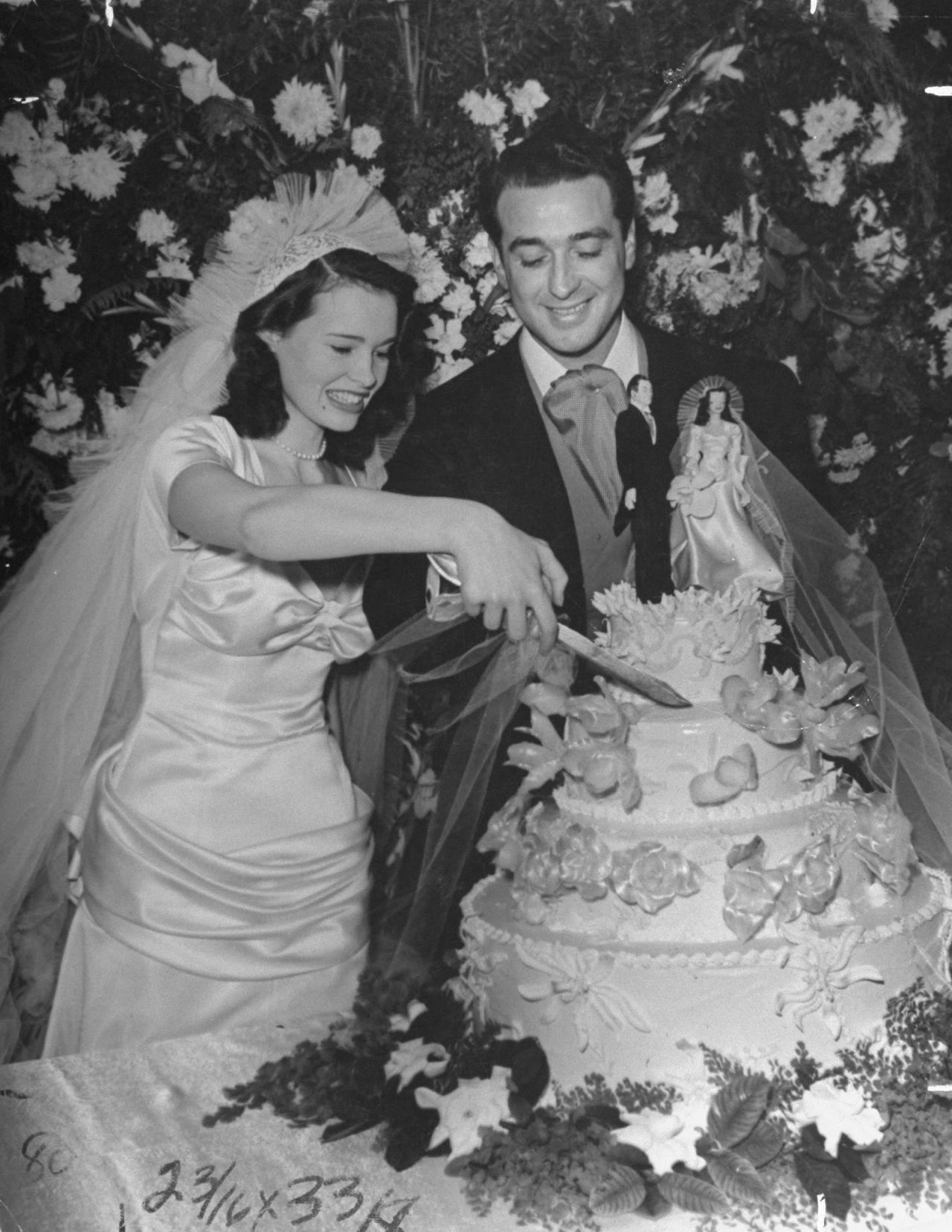 Vanderbilt and her first husband, Hollywood agent Pat DiCicco, cut their wedding cake in 1941. Vanderbilt was 17. At 21, she took control of a $4.3 million trust fund her father had left her. She divorced DiCicco two months later and promptly remarried — this time to conductor Leopold Stokowski, who was 63 at the time.