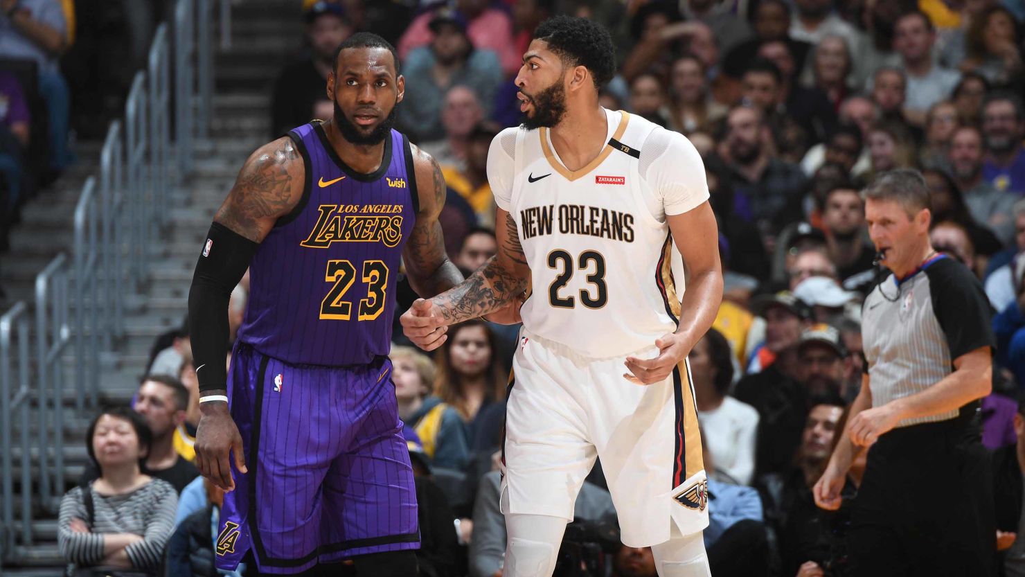 LeBron James #23 of the Los Angeles Lakers and Anthony Davis #23 of the New Orleans Pelicans fight for position during a game on December 21, 2018 at STAPLES Center in Los Angeles, California. 