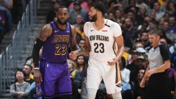 LOS ANGELES, CA - DECEMBER 21: LeBron James #23 of the Los Angeles Lakers and Anthony Davis #23 of the New Orleans Pelicans fight for position during a game on December 21, 2018 at STAPLES Center in Los Angeles, California. NOTE TO USER: User expressly acknowledges and agrees that, by downloading and/or using this Photograph, user is consenting to the terms and conditions of the Getty Images License Agreement. Mandatory Copyright Notice: Copyright 2018 NBAE (Photo by Andrew D. Bernstein/NBAE via Getty Images)