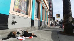 LOS ANGELES, CALIFORNIA - JUNE 06: A man sleeps on the street near Hollywood Boulevard on June 06, 2019 in Los Angeles, California. The homeless population count in Los Angeles County leapt 12 percent in the past year to almost 59,000, according to officials. A lack of affordable housing in Los Angeles is the primary factor driving the spike in homelessness, according to Los Angeles Mayor Eric Garcetti.  (Photo by Mario Tama/Getty Images)
