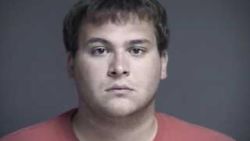 John Austin Hopkins, 25, was indicated on 36 counts of gross sexual imposition involving 28 of the girls, authorities said.