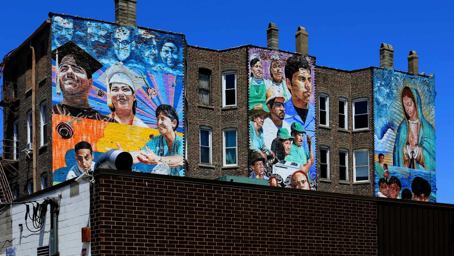 Jeff Zimmerman's 'Increibles Las Cosas A Se Ven' mural is displayed in the Pilsen neighborhood in Chicago, Illinois on June 7, 2019. (Photo By Raymond Boyd/Getty Images)
