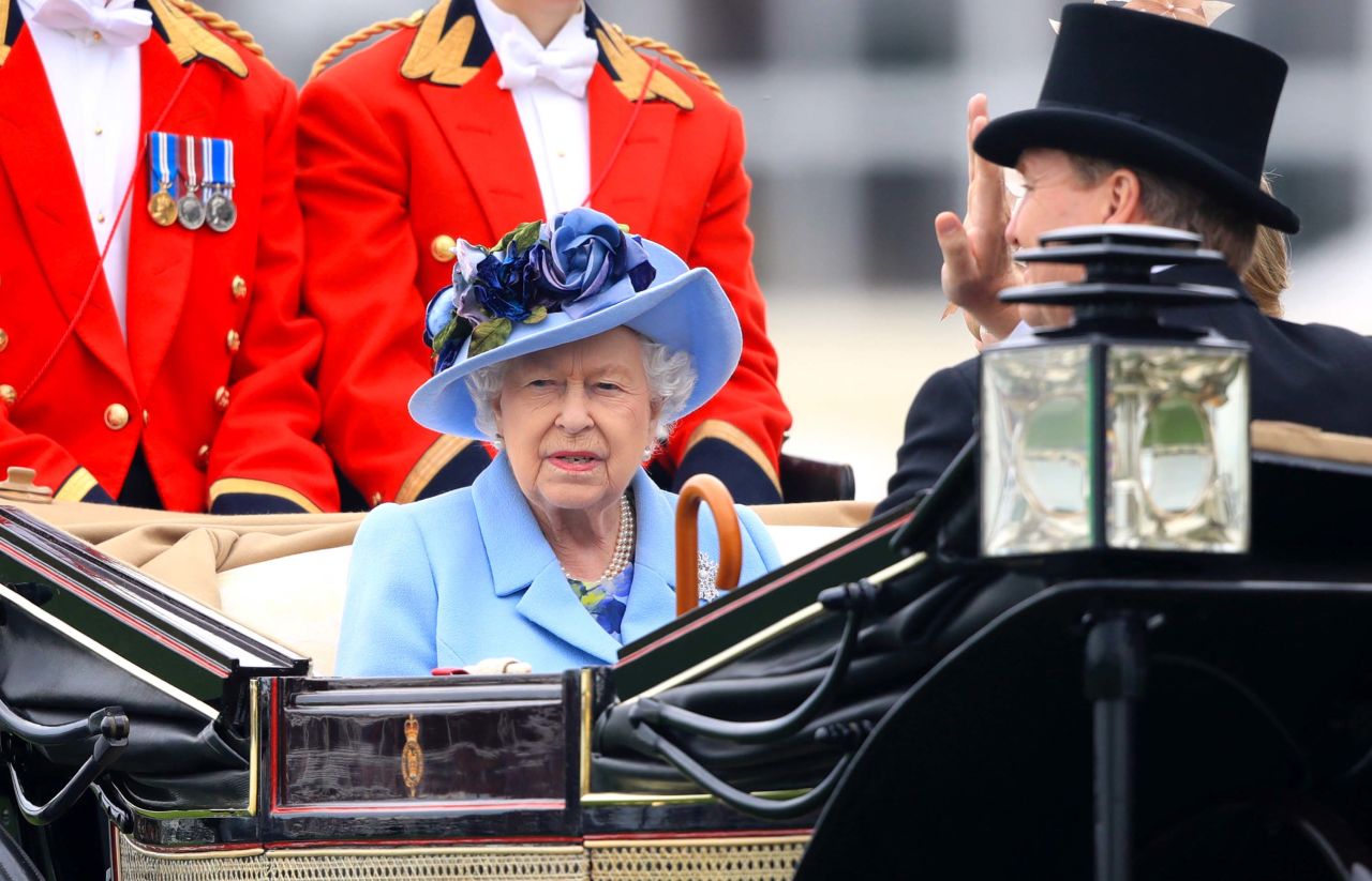 Britain's Queen Elizabeth II riding in the leading carriage during the Royal Procession to open Royal Ascot 2019. 