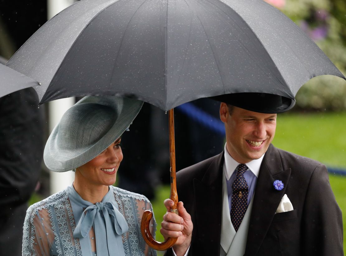 Prince William and the Duchess of Cambridge are undeterred by the rain at Royal Ascot.