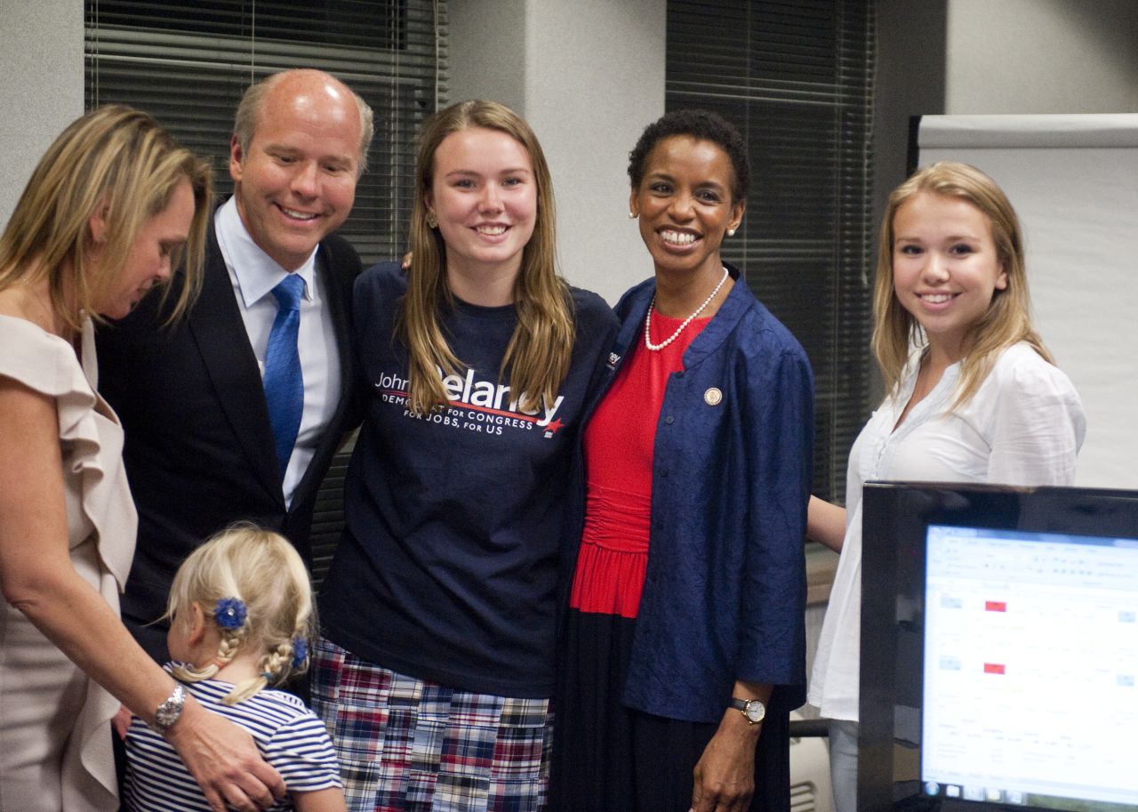 Delaney and his family pose with US Rep. Donna Edwards, second from right, while watching primary returns in April 2012. Delaney and his wife, April, have four children.