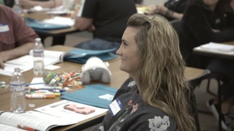 Participant in Mental Health First Aid Class listens to instructor in Defiance, Ohio workshop. 