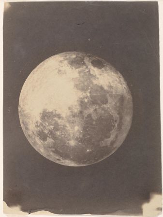 The Met's exhibition features two daguerreotypes believed to be the earliest existing photographs of the moon. The daguerreotype process was an early photographic process that used an iodine-sensitized silvered plate and mercury vapor to capture images.
