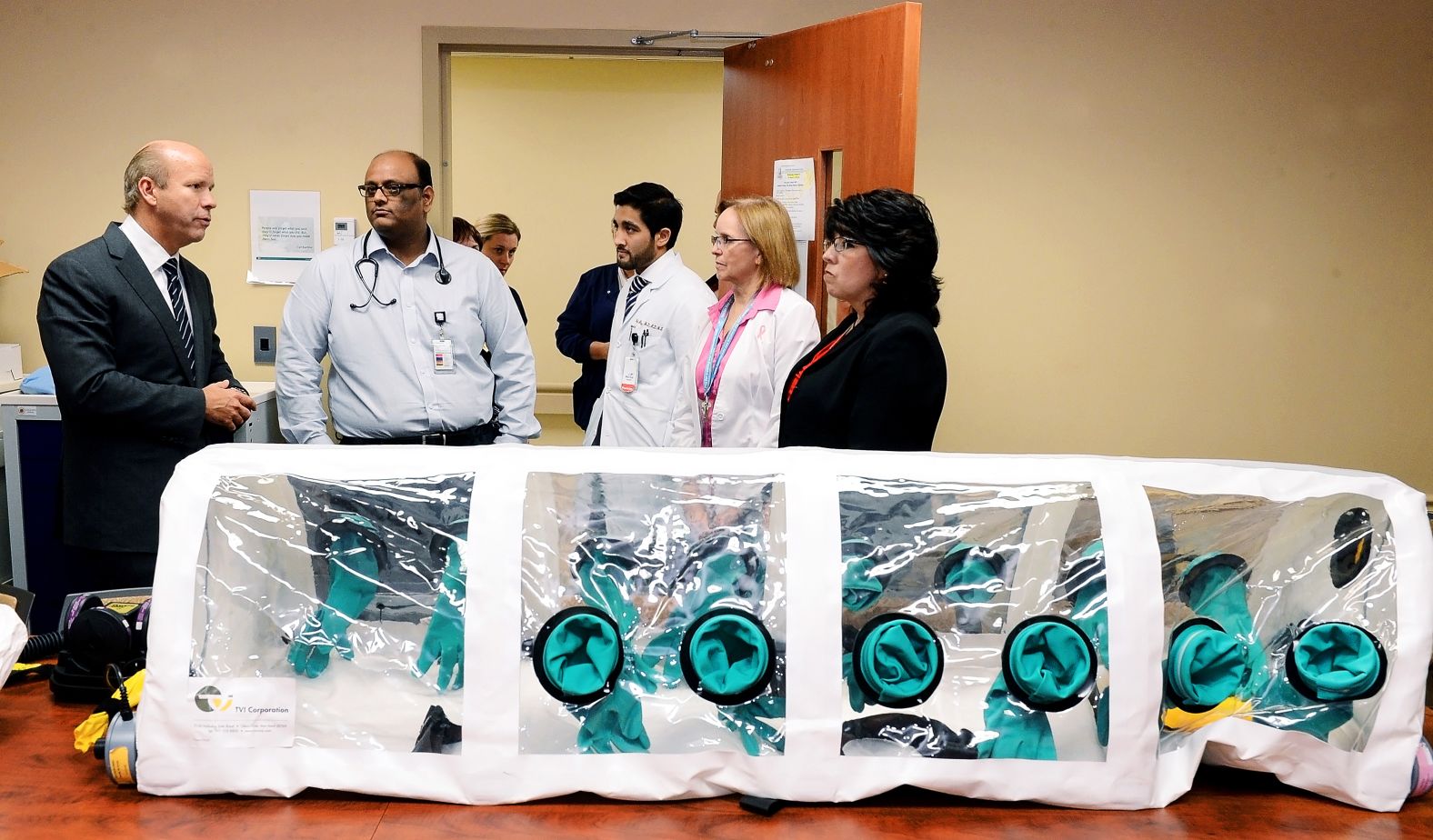 Delaney talks with staff members at Hagerstown's Meritus Medical Center while reviewing the hospital's Ebola preparations in October 2014.