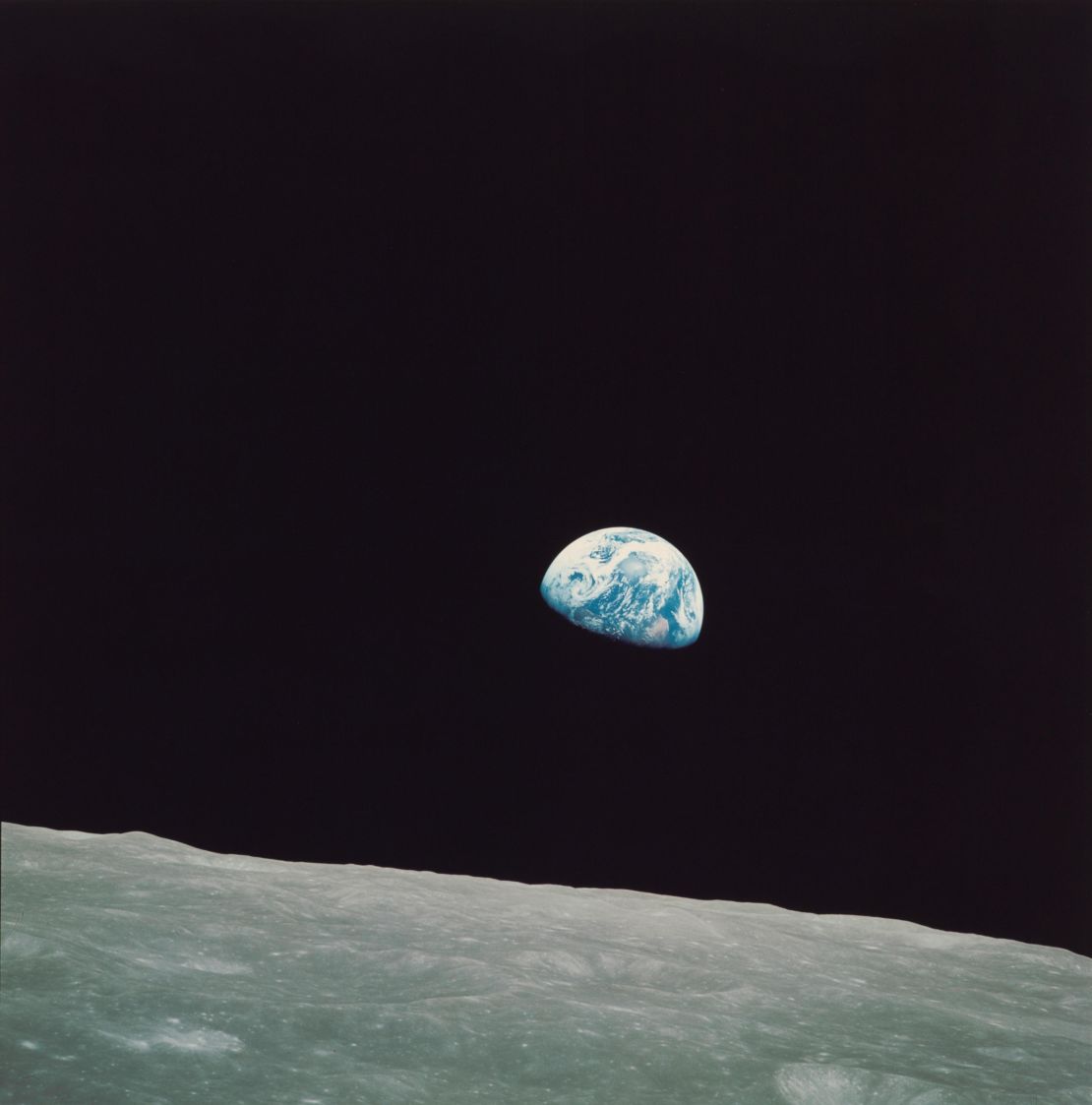 Engineer and astronaut William Anders participated in the Apollo 8 flight, which made the first manned voyage around the moon. Anders photographed the trip relentlessly, producing this iconic image of the Earth from space. 