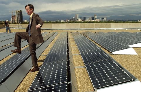 Hickenlooper jokes around as the Denver Museum of Nature and Science unveils new solar panels in June 2008.