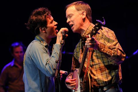 Hickenlooper plays the banjo in July 2014 while performing with Ketch Secor of Old Crow Medicine Show.
