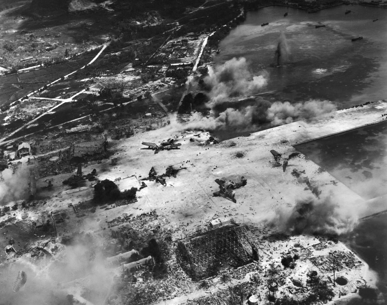 An aerial view of smoke from the US artillery and naval bombardment of a Japanese seaplane base at Flores Point, near Tanapag harbor, during the US invasion of Saipan in June 1944.