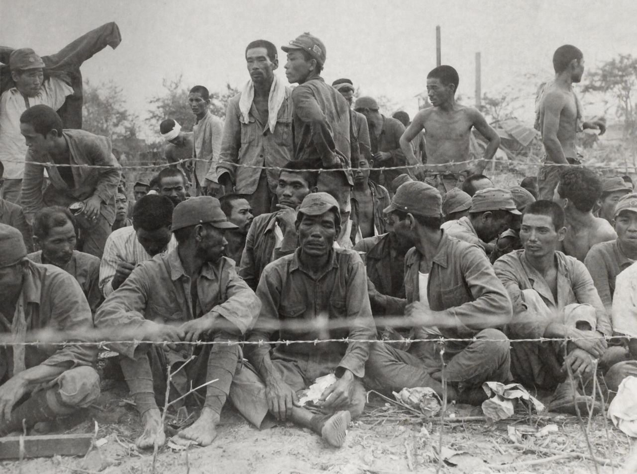 Japanese POWs seen in an enclosure during the Battle of Saipan are some of the more than 900 who surrendered on Saipan.