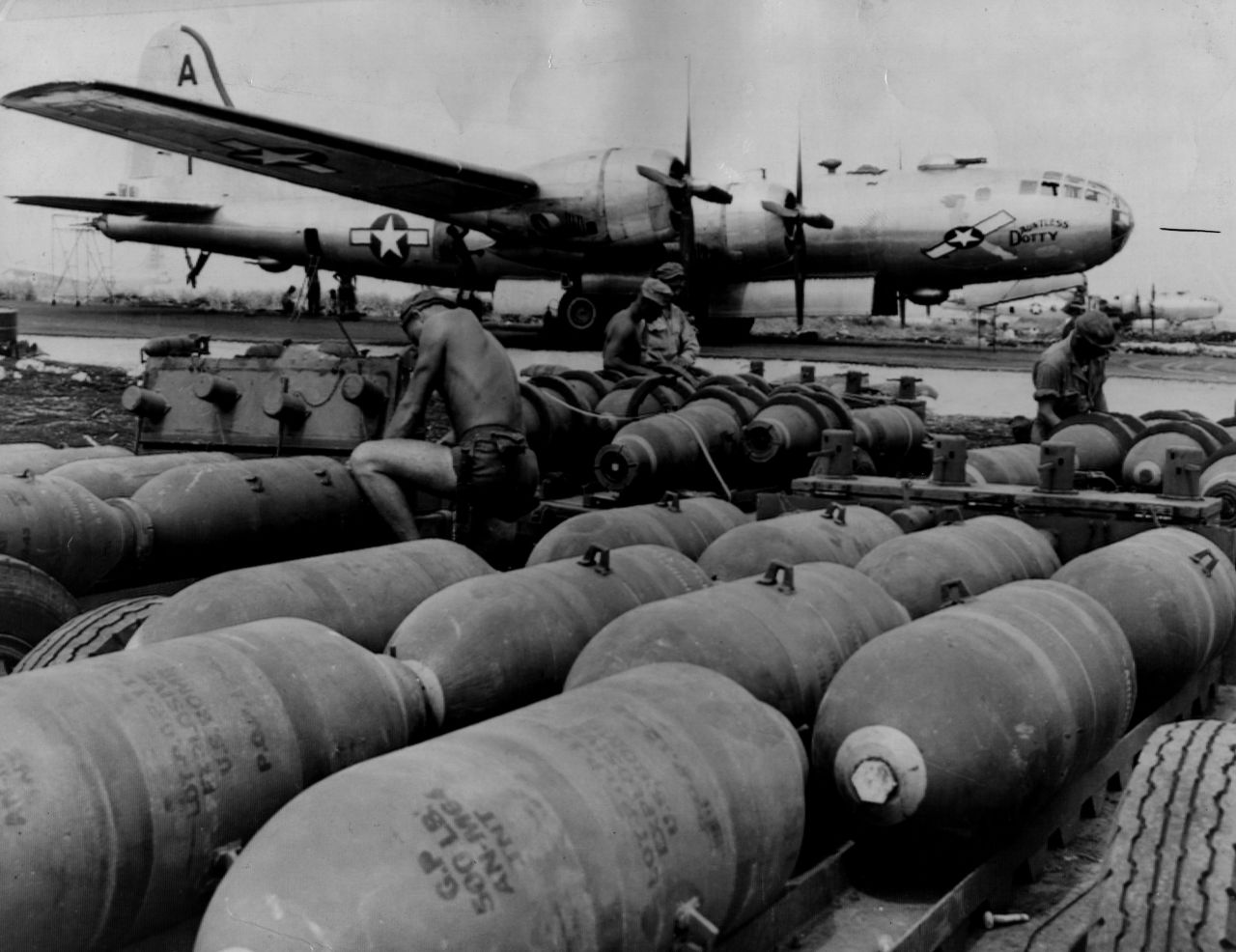 'Dauntless Dottie,' one of America's B-29 Superfortress bombers, is made ready for a bombing run on Tokyo.