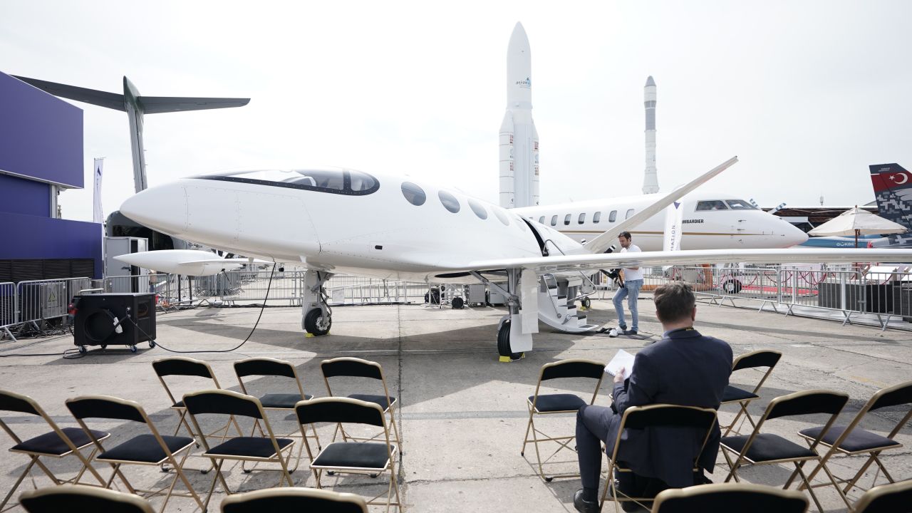 A visitor to the Paris Air Show looks at the Alice electric aircraft manufactured by Eviation Aircraft.