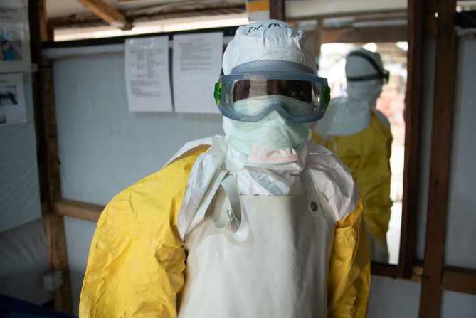 This is Guinean Modet's third Ebola outbreak. Despite all the barriers both medical and physical, he insists patients are treated with humanity. "We need to treat them like a member of our family," he says.