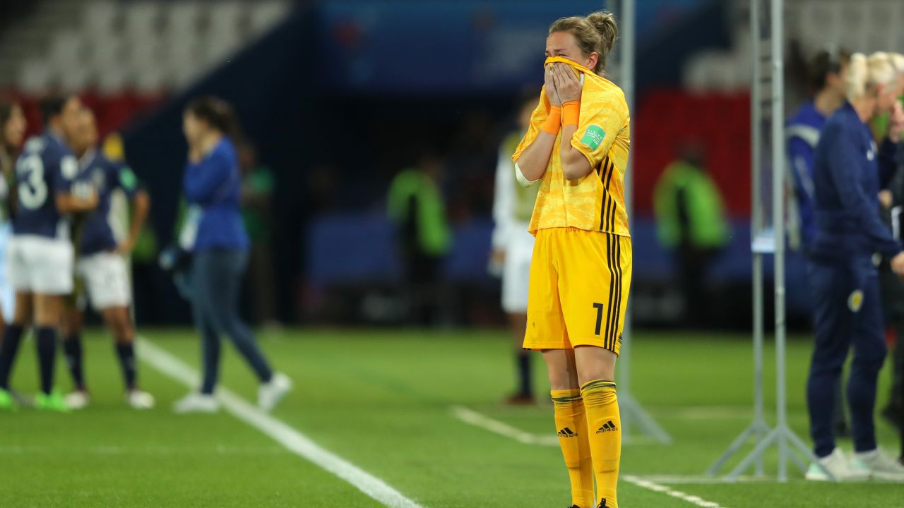 Scotland's Lee Alexander wipes away the tears after the 3-3 draw with Argentina.