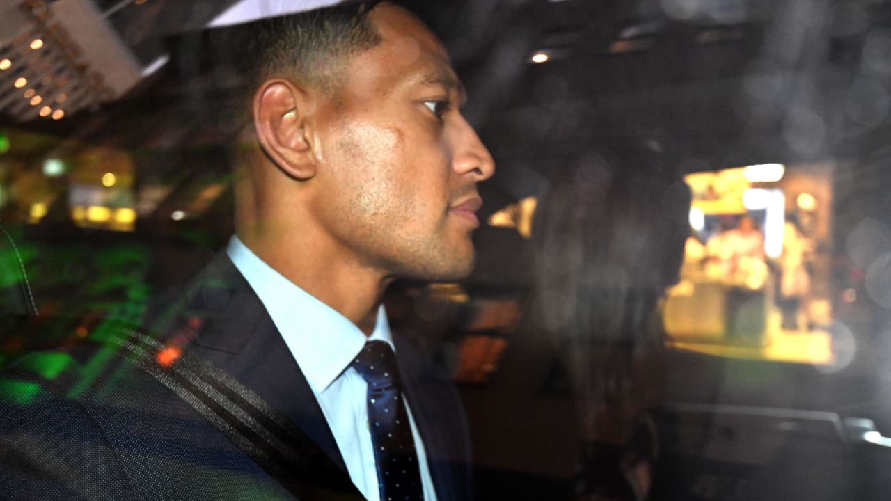 Folau leaves after a code of conduct hearing in Sydney.