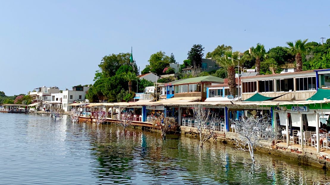 The lively village of Göltürbükü occupies a pretty bay where restaurants jut over the water on floating docks and bars thrum with live music.