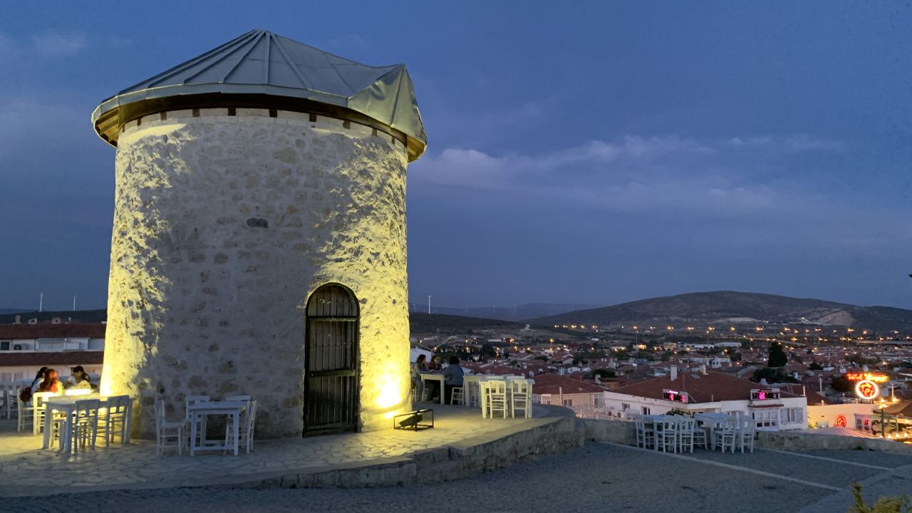 <strong>Windmill:</strong> Located at the top of the hill in Alaçati, it's a lovely vantage point for seeing the lights of the town.