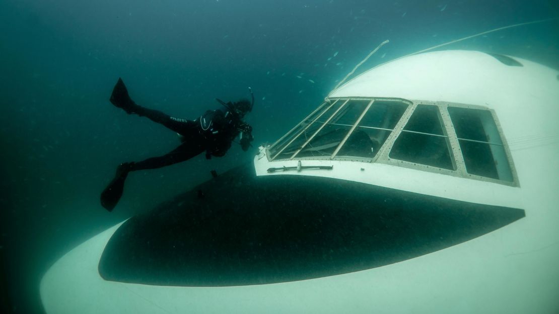 A diver explores the submerged jet in Bahrain.