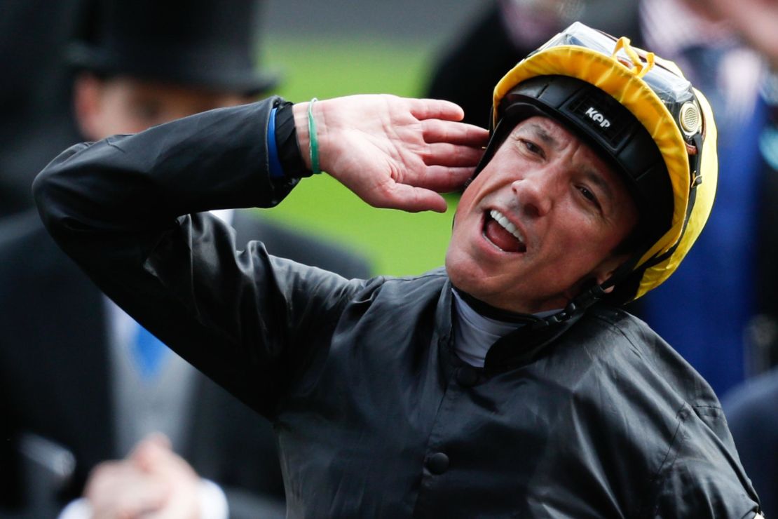 Italian jockey Frankie Dettori celebrates after winning the Ascot Gold Cup on Stradivarius.