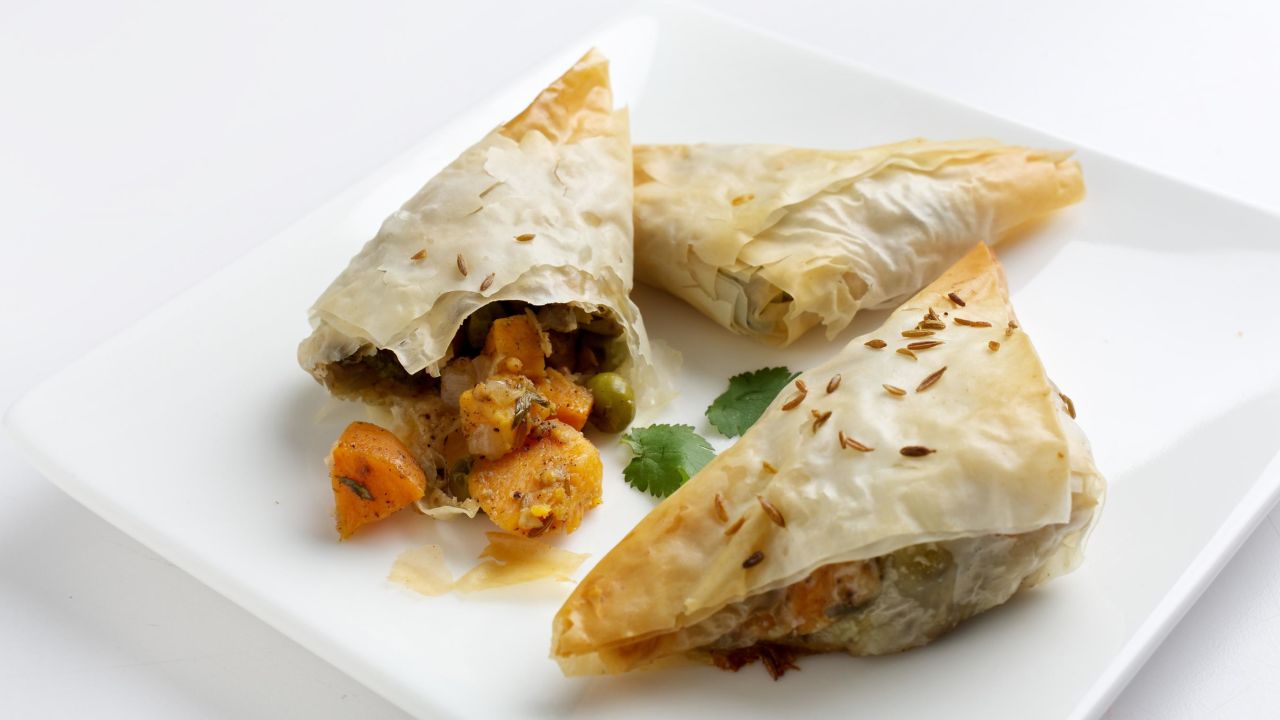 Samosas are a tasty triangular treat.