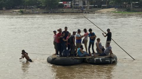 Ferrymen illegally but openly transfer goods and humans across the Suchiate River for the equivalent of just over a dollar a head