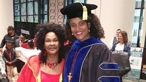 Marijuana Pepsi Vandyck (right) with her mother, Maggie Johnson, at her graduation in May. Vandyck received her doctorate in educational leadership. 