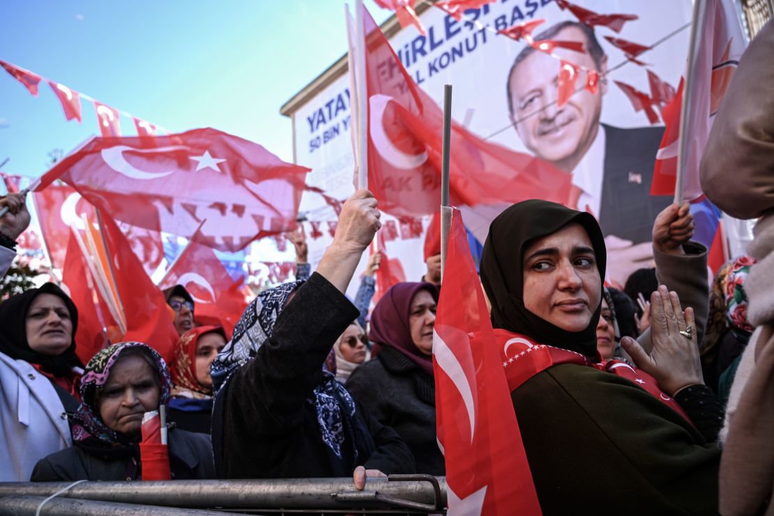 AKP supporters wave Turkish flags at a campaign rally in Kasımpaşa in March.