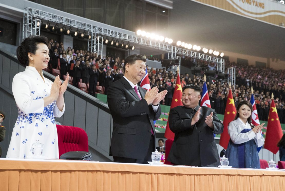 Xi Jinping, second from left, and his wife Peng Liyuan, left, and Kim Jong Un, second from right, and his wife Ri Sol Ju, right, in Pyongyang, North Korea.