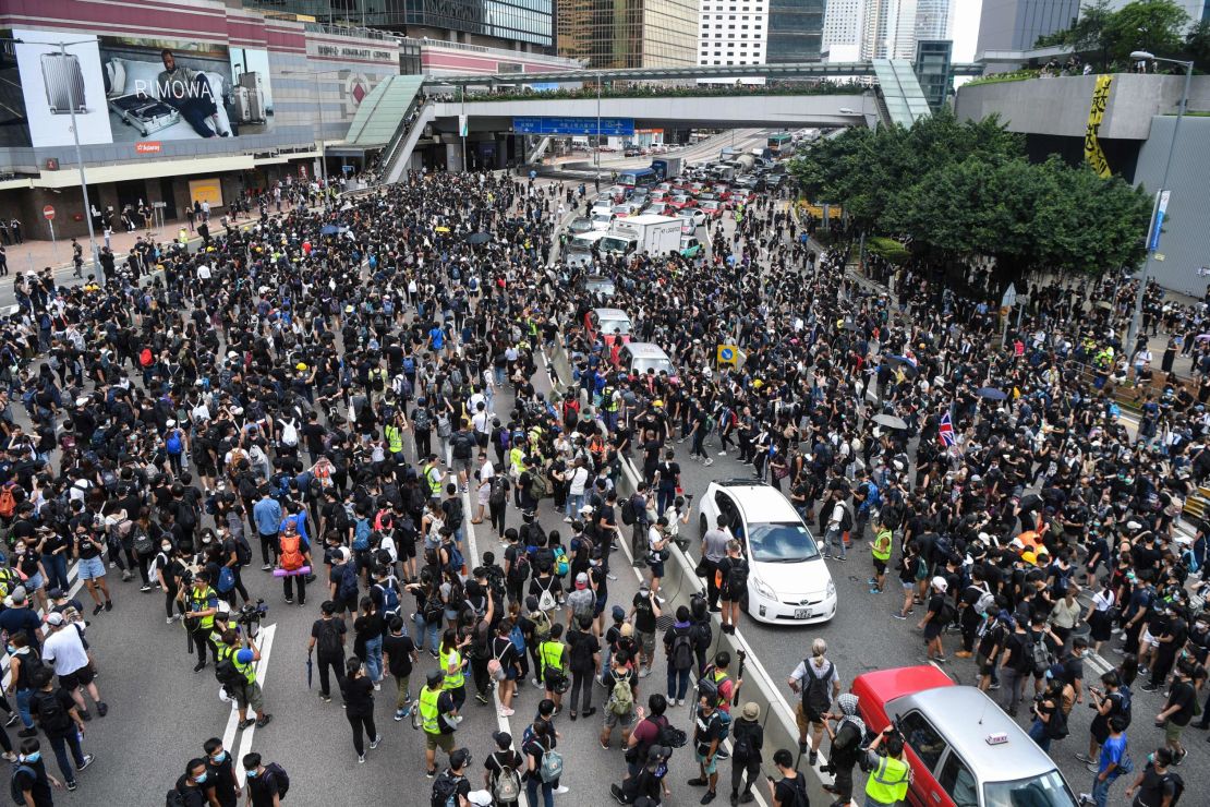 Protesters occupy a main road outside the government headquarters in Hong Kong on June 21, 2019.