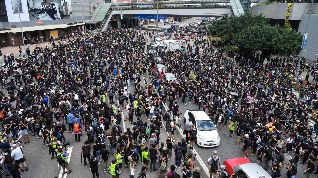 Protesters occupy a main road outside the government headquarters in Hong Kong on June 21, 2019.