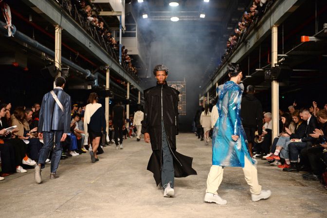 Models walk the runway at the A-Cold-Wall show during London Fashion Week Men's at The Printworks.