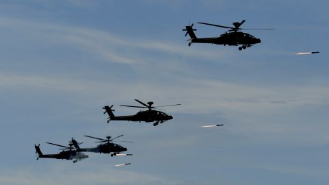 Four US-made Apache attack helicopters launch missiles during the 35th "Han Kuang" military drill in southern Taiwan on May 30.