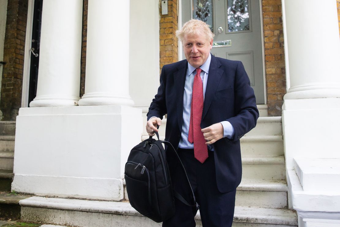 Boris Johnson leaves his home in south London on Friday after he emerged as the front-runner in the leadership race.