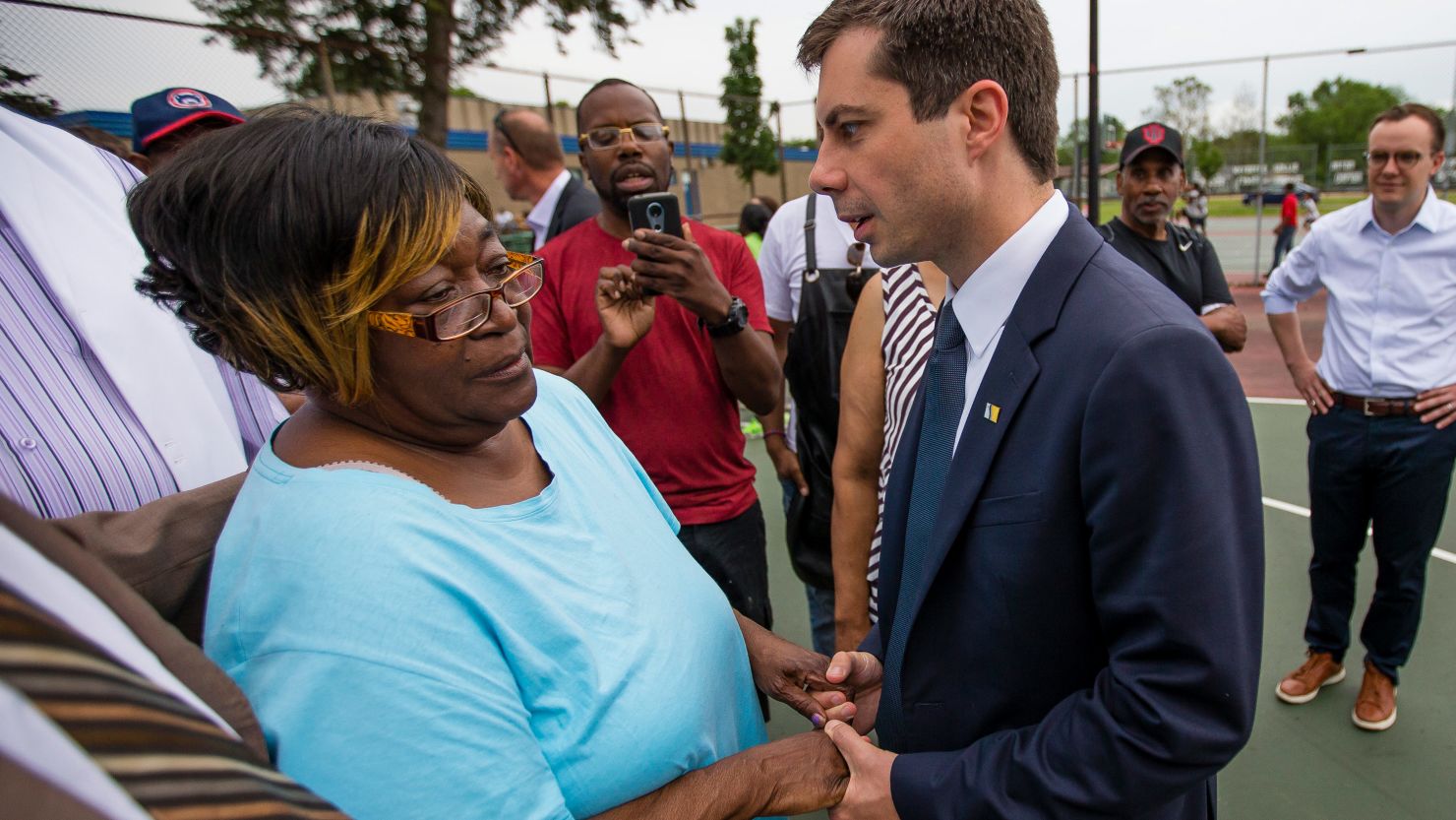South Bend Mayor Pete Buttigieg shares a moment with Shirley Newbill, the mother of shooting victim Eric Logan.