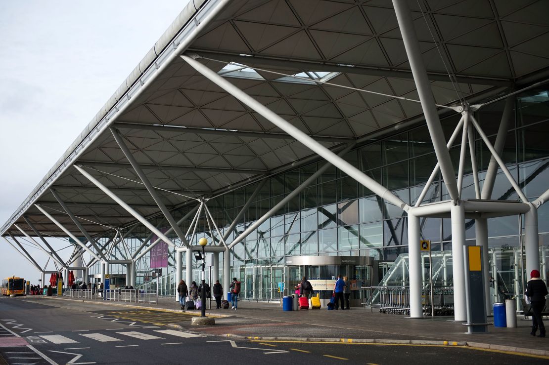 A 25-year-old woman was arrested by Essex Police after the aircraft returned to Stansted.