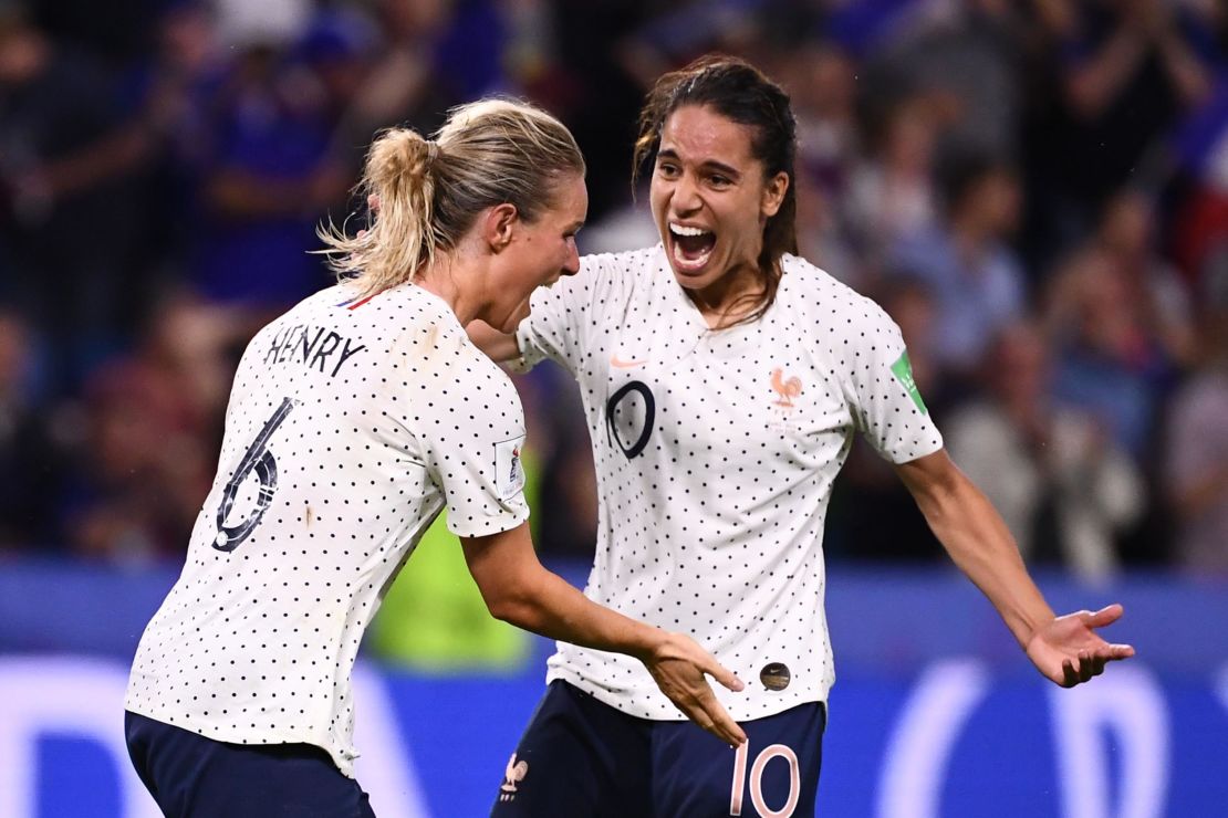 France's midfielder Amandine Henry celebrates after putting her side 2-1 ahead in extra time of the last 16 Women's World Cup clash against Brazil in Le Havre. 